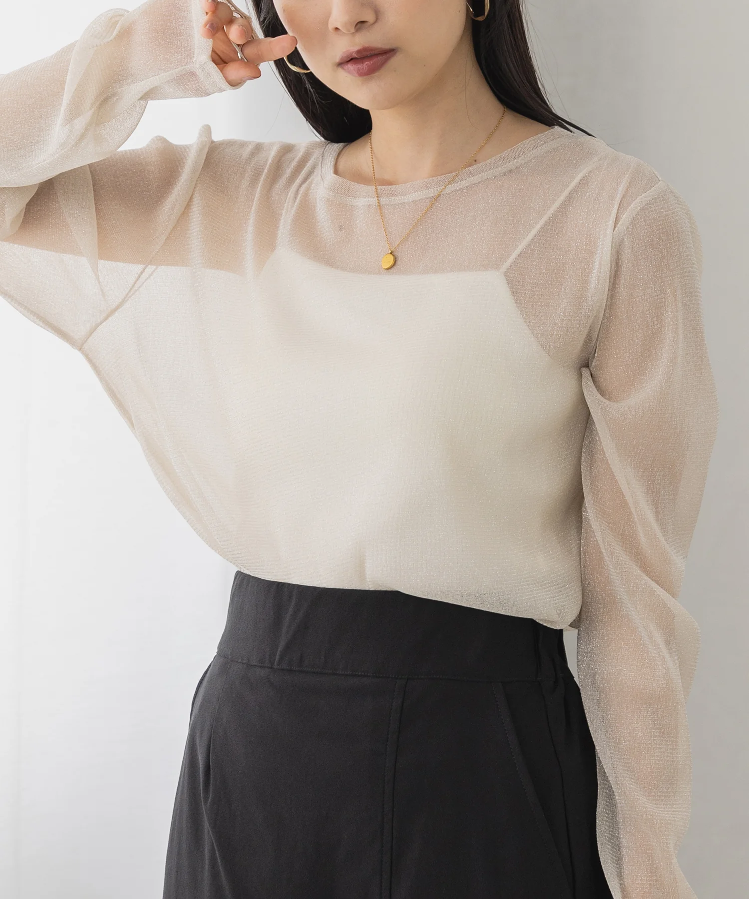 ラメシアークルーネックトップス